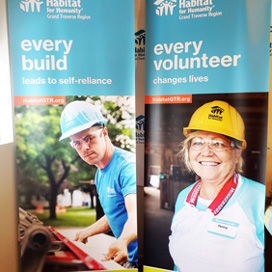 Two Habitat For Humanity Retractable Banners