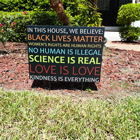 in this house we believe sign in mulch