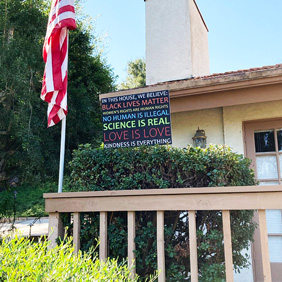 believe sign on a front porch